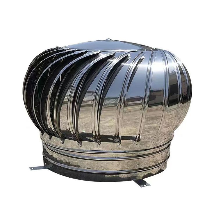 Cyclone wind driven roof ventilator installed on industrial building roof, unpowered turbine ventilation system for improving airflow and reducing heat buildup.