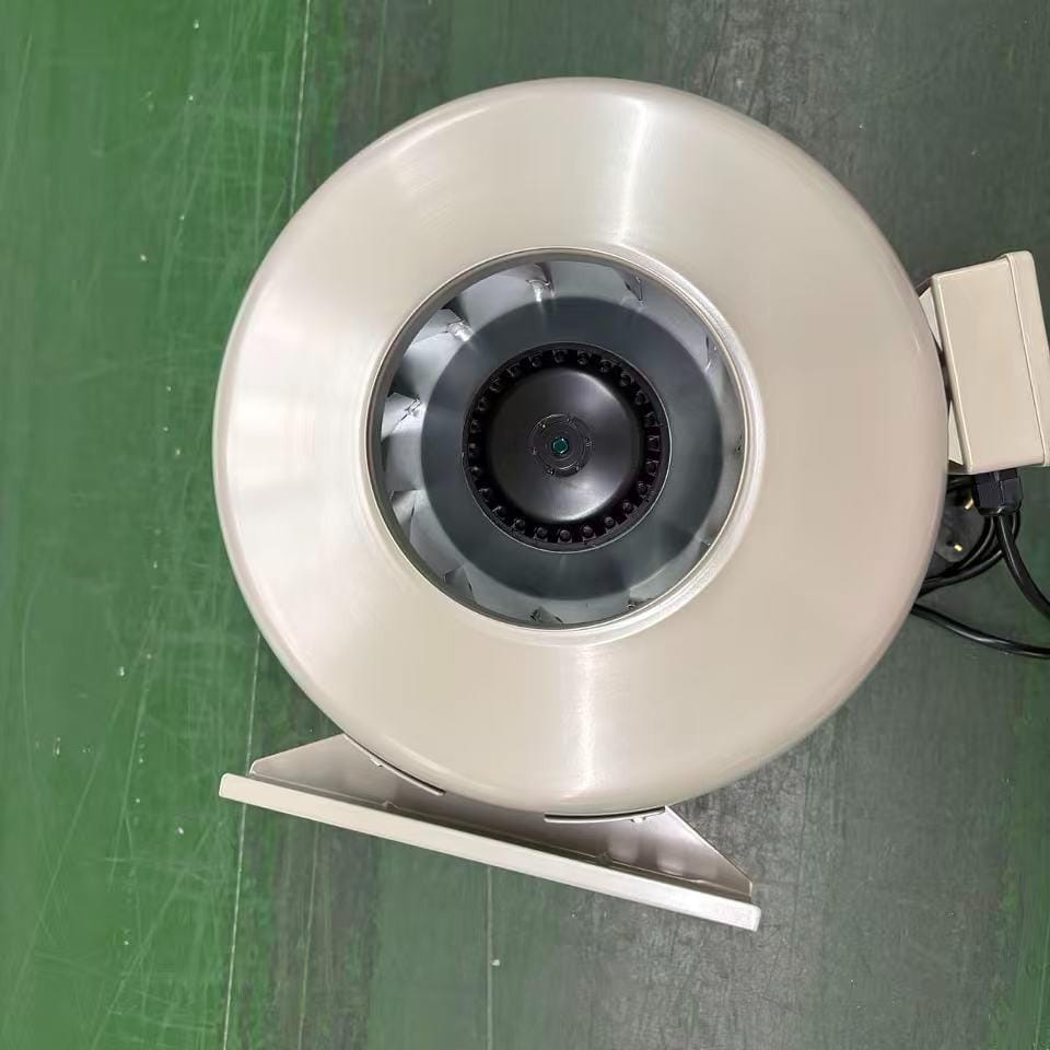 Circular duct inline ventilation fan installed in HVAC air duct system for industrial airflow