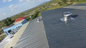 Cyclone fan installed in a chicken house for poultry ventilation in Nairobi Kenya