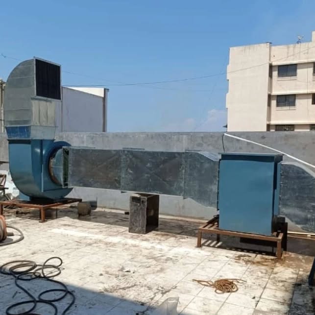 Heavy-duty centrifugal blower with galvanized ductwork installed for high air flow industrial ventilation and exhaust system in Kenya