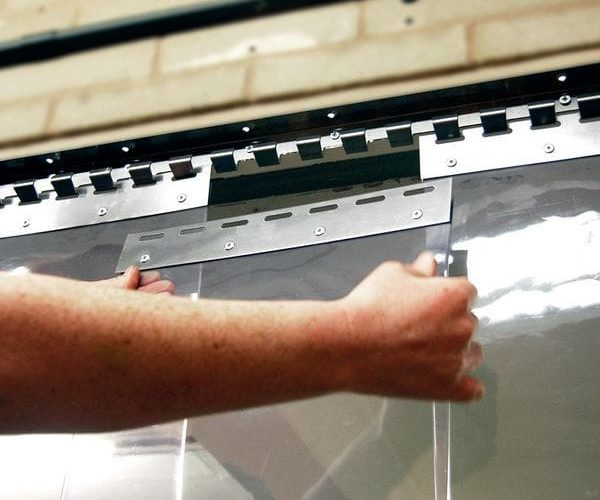 Professional PVC strip curtain installation in Kenya for cold rooms, warehouses, factories, food processing plants, supermarkets, commercial kitchens, and industrial buildings.