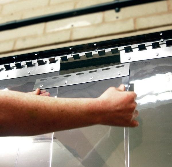 Professional PVC strip curtain installation in Kenya for cold rooms, warehouses, factories, food processing plants, supermarkets, commercial kitchens, and industrial buildings.