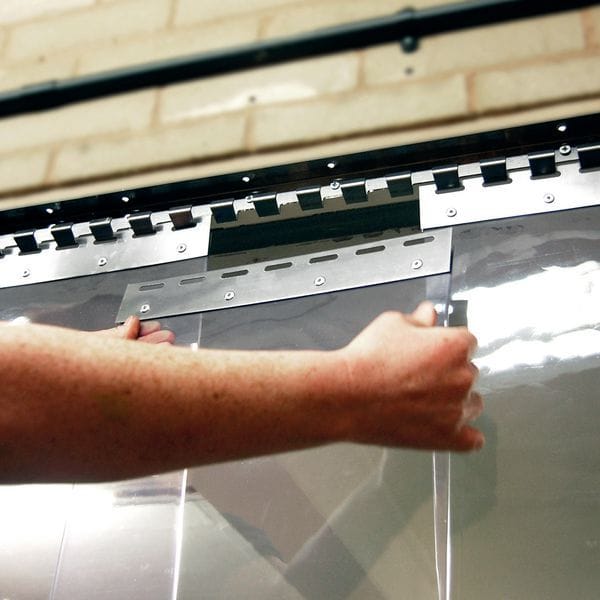 Professional PVC strip curtain installation in Kenya for cold rooms, warehouses, factories, food processing plants, supermarkets, commercial kitchens, and industrial buildings.
