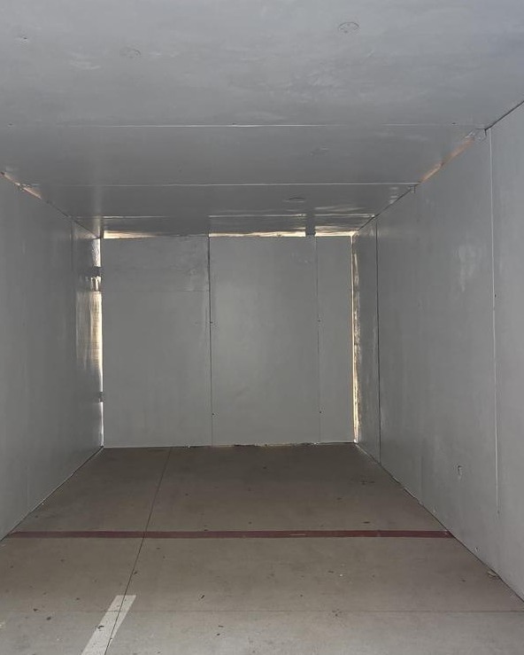 Finished insulated panel walls of an empty cold room