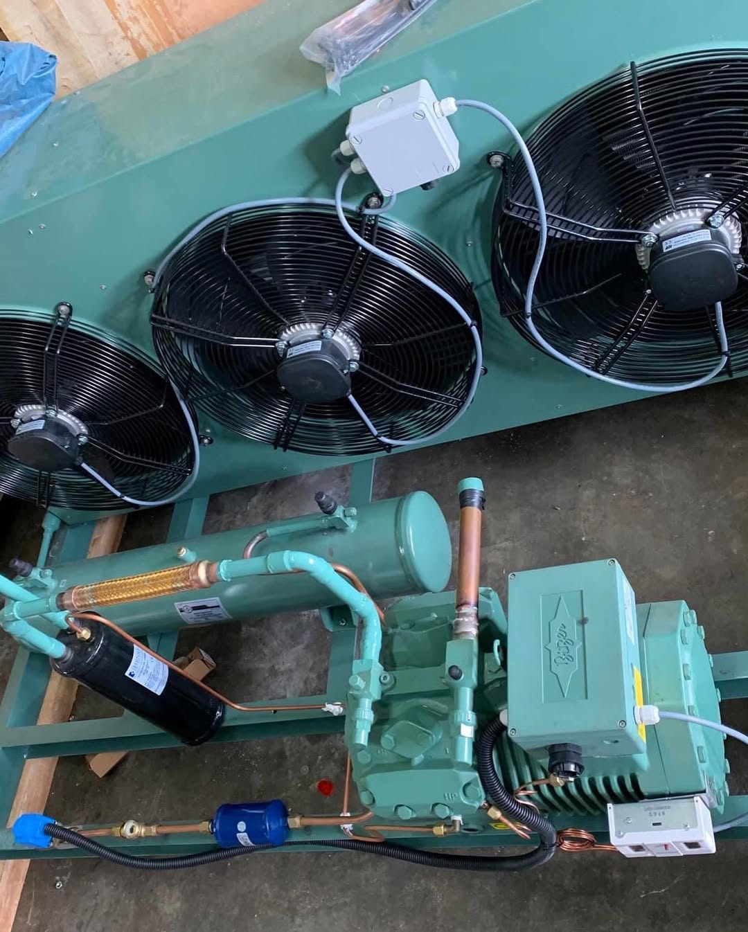 Overhead view of a refrigeration condenser unit being assembled