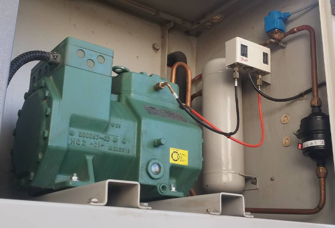 Close-up of a Bitzer compressor unit during servicing
