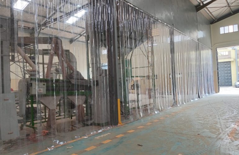 PVC strip curtain installation at an industrial doorway in Kenya